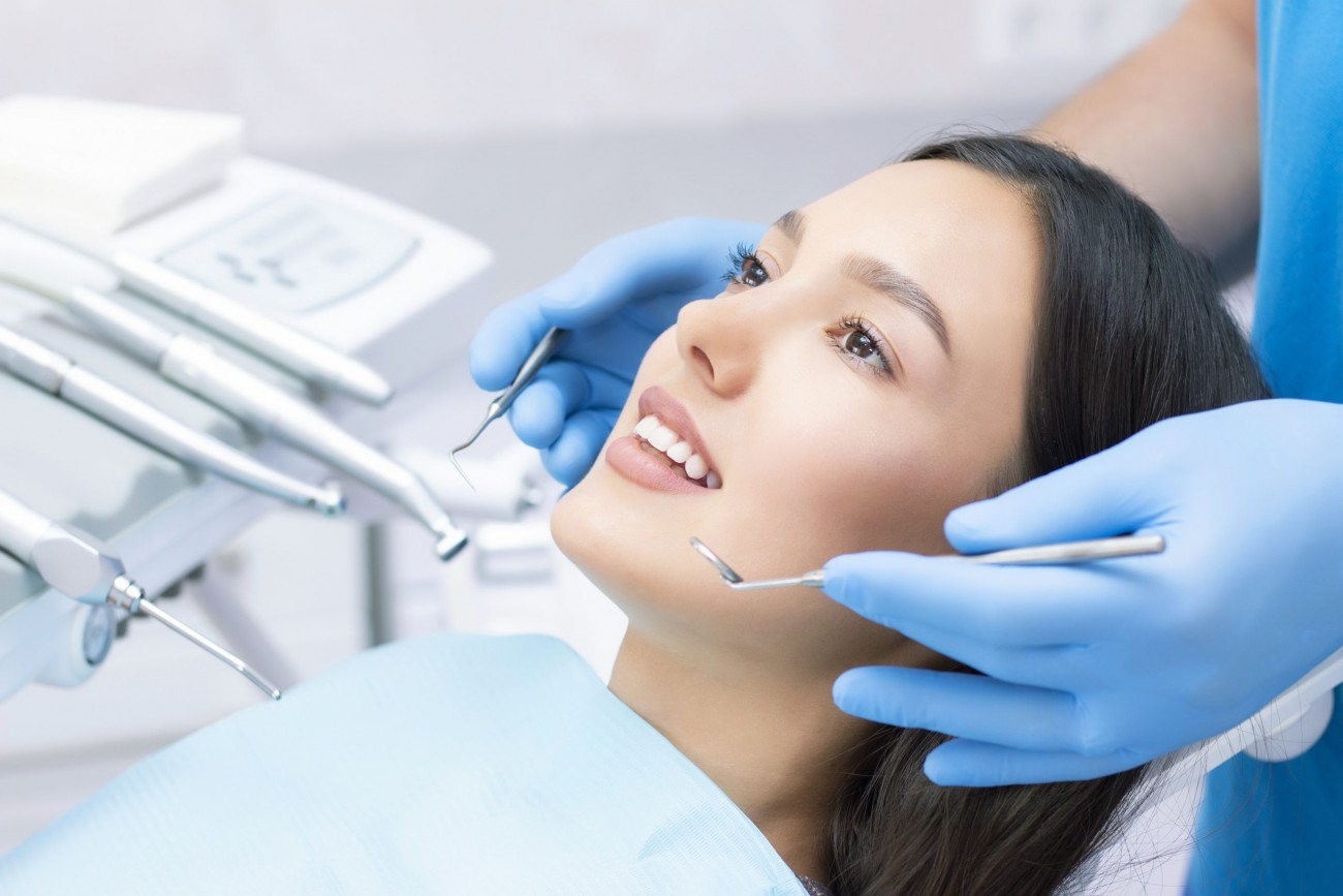 Young Female Patient With Pretty Smile Examining Dental Inspection Dentist Clinic 1 Scaled